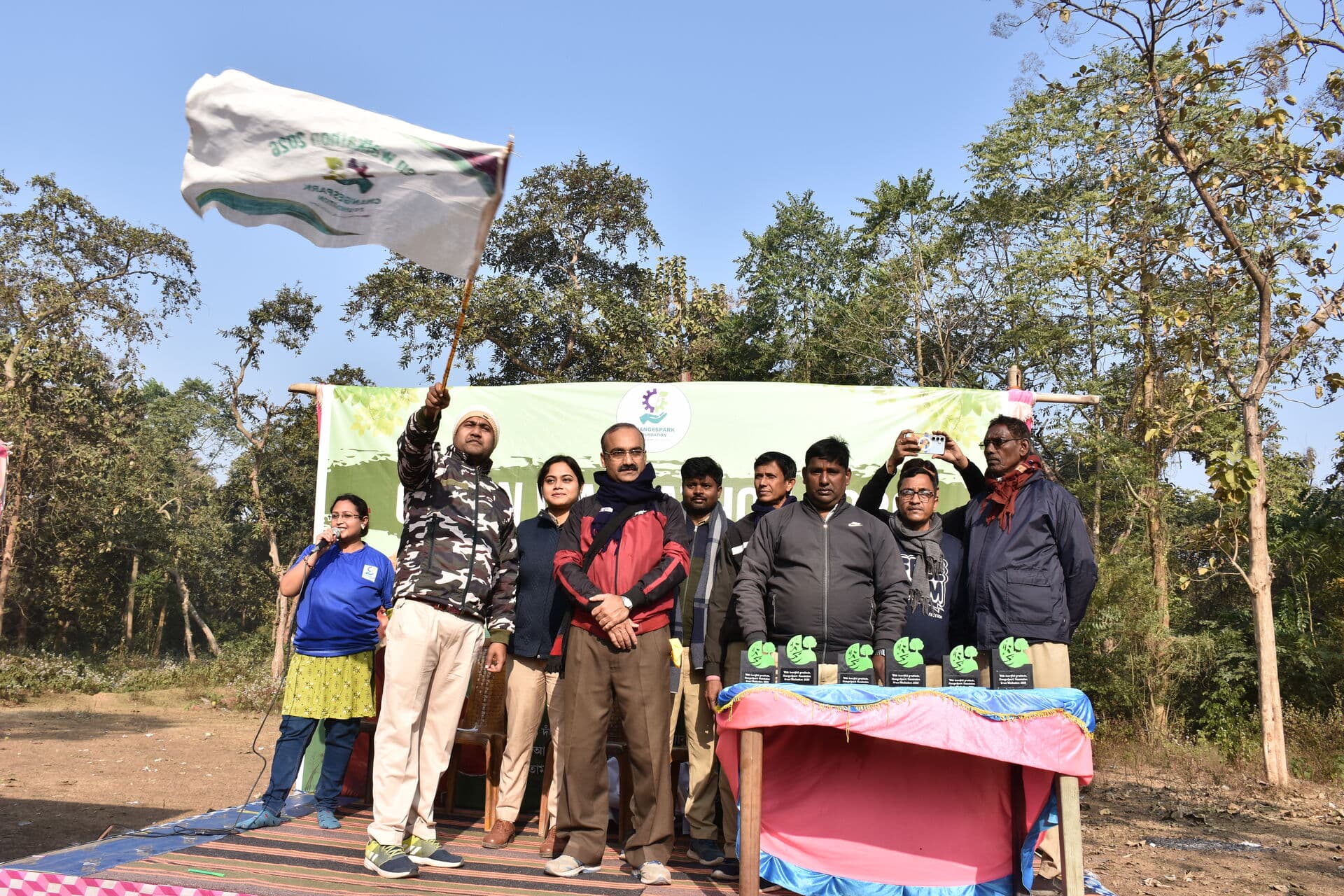 Flag hoisting ceremony with dignitaries