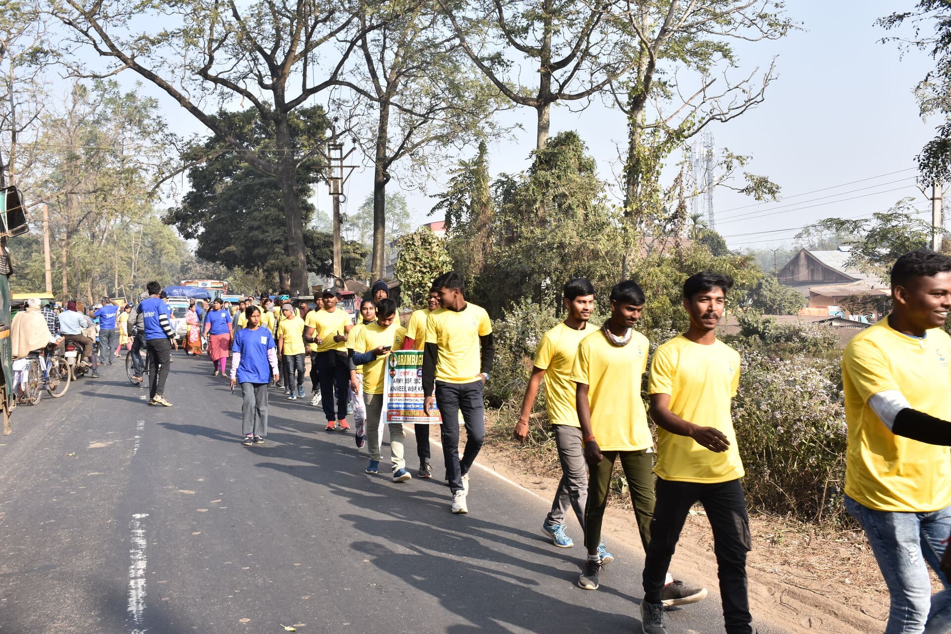 Long line of walkers on the road